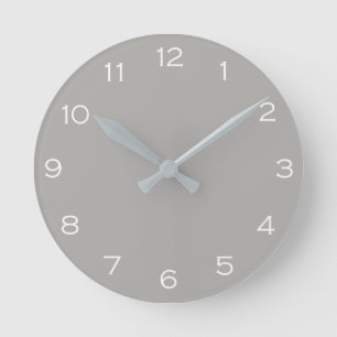 White Numbers On Grey wccn Round Clock