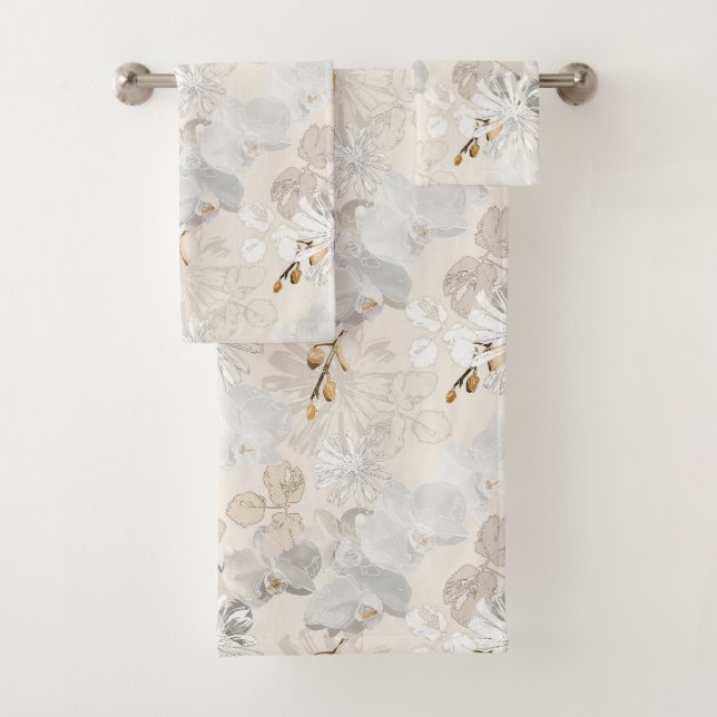 White orchids on a light cream   bath towel set (Insitu)