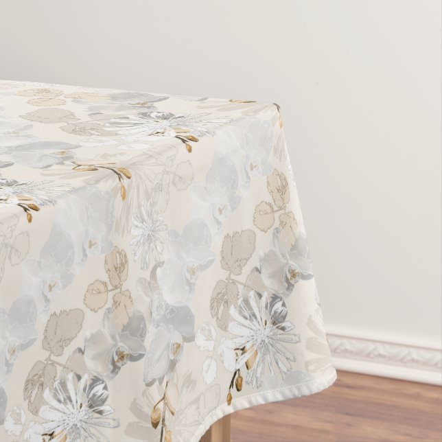 White orchids on a light cream  tablecloth (In Situ)