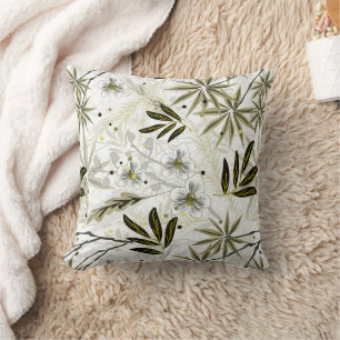 White orchids with olive tropical leaves cushion