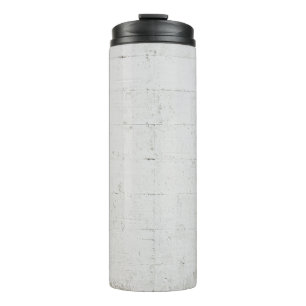 White painted concrete wall concrete thermal tumbler