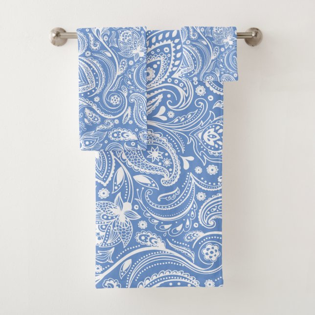 White paisley pattern on blue background bath towel set (Insitu)