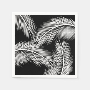 White palm leaves on black colour background napkin