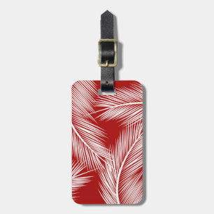White palm leaves on red colour background luggage tag