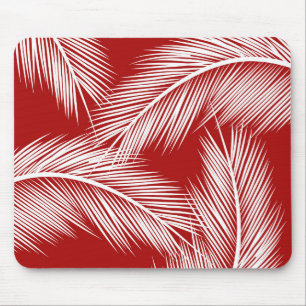 White palm leaves on red colour background mouse pad