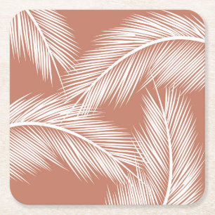 White palm leaves on terracotta colour background square paper coaster