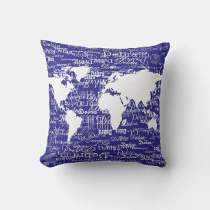 white pattern of names & world map on deep-blue cushion
