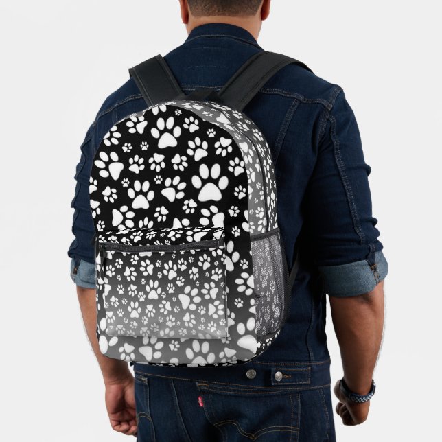 White pattern paws on gradient background printed backpack (Insitu (Model))