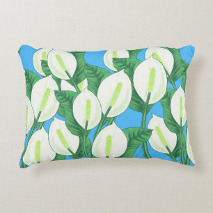 White peace lilies on pale blue background  decorative cushion