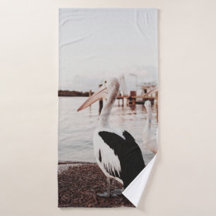 WHITE PELICAN ON BODY OF WATER DURING DAYTIME BATH TOWEL