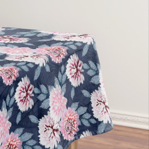 White, pink flowers on dark blue. Tablecloth