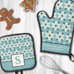 White Poinsettia on Blue Floral Monogrammed Oven Mitt & Pot Holder Set<br><div class="desc">Add a touch of elegance to your holiday kitchen with this beautiful oven mitt and pot holder set featuring a white poinsettia flower pattern with green accents on a serene blue background. Perfect for bringing festive charm to your culinary space, this set is both stylish and functional. Customise it with...</div>