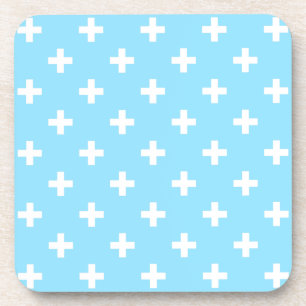 White polka crosses on baby blue coaster