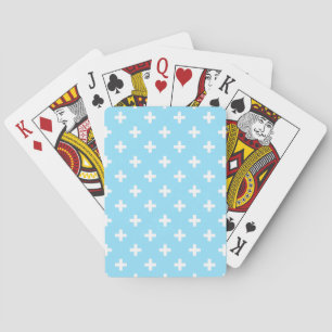 White polka crosses on baby blue playing cards