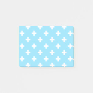 White polka crosses on baby blue post-it notes