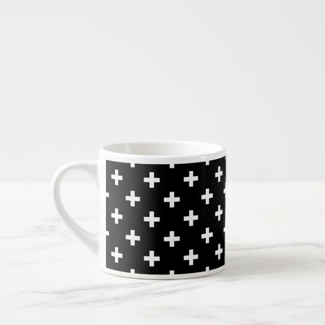 White polka crosses on black espresso cup (Left)