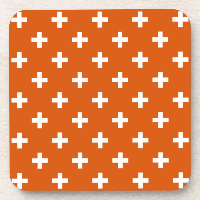 White polka crosses on burnt orange coaster (Front)