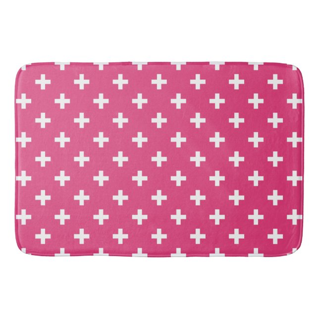 White polka crosses on fuchsia bath mat (Front)