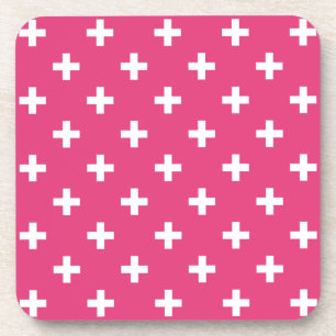 White polka crosses on fuchsia coaster