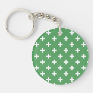 White polka crosses on green key ring