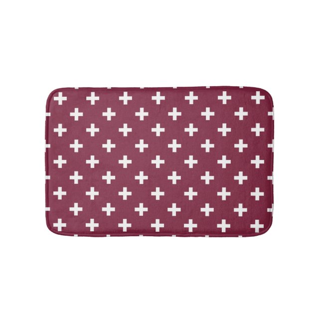 White polka crosses on mulberry bath mat (Front)