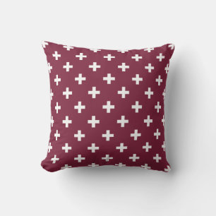 White polka crosses on mulberry cushion
