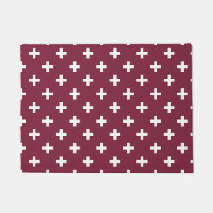 White polka crosses on mulberry doormat