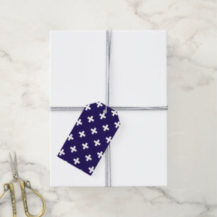White polka crosses on navy blue gift tags