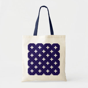White polka crosses on navy blue tote bag