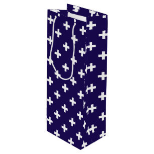 White polka crosses on navy blue wine gift bag
