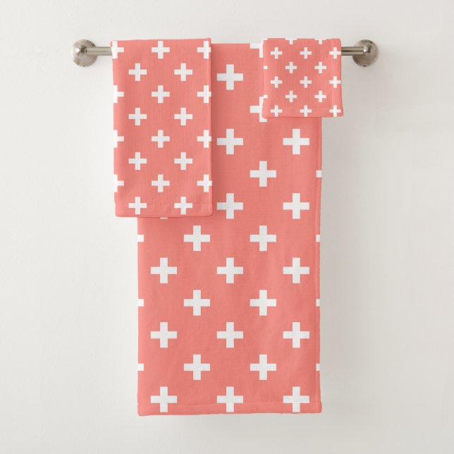 White polka crosses on peach bath towel set (Insitu)
