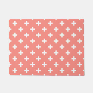 White polka crosses on peach doormat