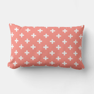 White polka crosses on peach lumbar cushion