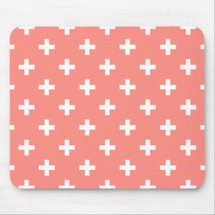 White polka crosses on peach mouse pad