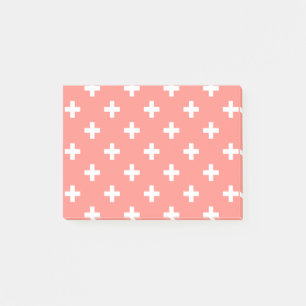 White polka crosses on peach post-it notes