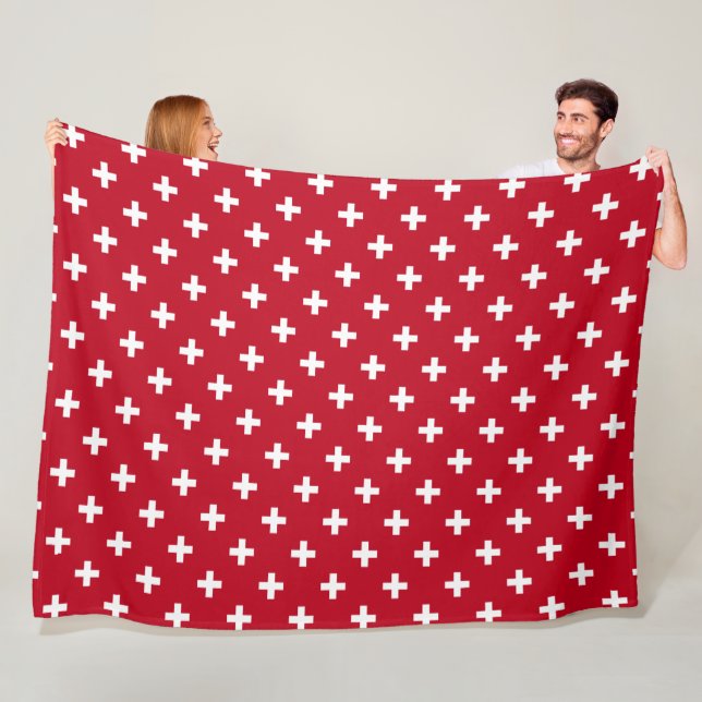 White polka crosses on red fleece blanket (In Situ)