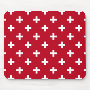 White polka crosses on red mouse pad