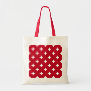 White polka crosses on red tote bag