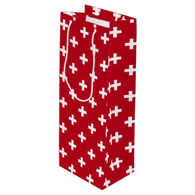 White polka crosses on red wine gift bag (Front Angled)