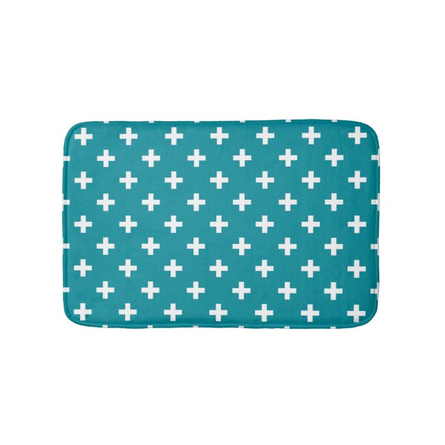 White polka crosses on teal bath mat (Front)