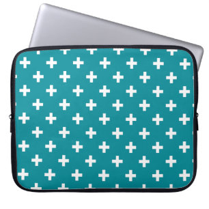 White polka crosses on teal laptop sleeve
