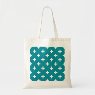 White polka crosses on teal tote bag