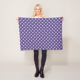 White polka crosses on ultra violet fleece blanket
