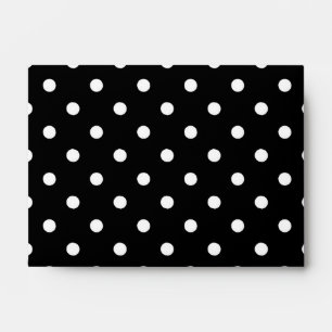 White polka dots medium on black envelope