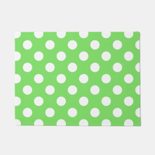 White polka dots on apple green doormat