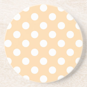 White polka dots on beige coaster
