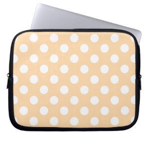White polka dots on beige laptop sleeve