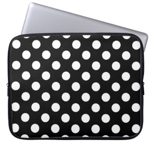 White polka dots on black laptop sleeve