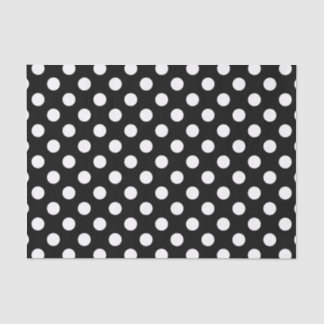 White polka dots on black tissue paper