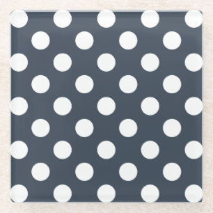 White polka dots on blue-grey glass coaster